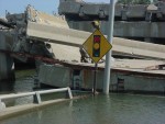 The bridge had a curve at the western end.  This sign and light warned of the intersection at Myrtle St.