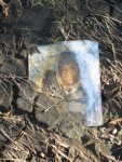 Hope for the Future: Graduation photo in flood silt, Lower 9th Ward