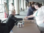 The Petal presses the flesh with CNN anchor Anderson Cooper at the ALA conference