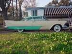 This was my favorite one of the three, a 57 Plymouth Savoy with cream over aqua. 