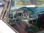 The cockpit of the Savoy. Note the four Powerflite transmission buttons to the far left. If this car was equipped with a Torqueflite, there would be five buttons.