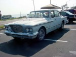 This beater of a 1961 Valiant V-200 was for sale in the parking lot of the Edgewater Mall.