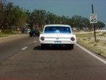 I never saw this car again. The Petal snapped this and the following image from our moving vehicle. I think this is a 62 Ford Galaxie, but I might be off by a year.