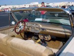 Inside, we find a vastly customized interior. 62 Fords did not have tilt wheels and tiny steering wheels and there are many more gauges than it originally sported.