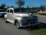 Post-war Plymouths and DeSotos used the same basic body, with differences in chromework. The Desoto had an enormous grill with vertical bars.