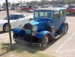 I think this is a Ford from the late 20's. These vastly older cars are a challenge for me to identify.