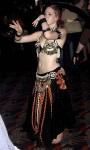 This was one of the bellydancers in the Drum Circle room. If you look carefully, you can see she is balancing a large sword on her head.