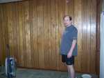 June 8, 2007 - It has taken a week, but the living room is finally cleared of all but one piece of furniture. Everyone's least loved part of our house, the wood paneling, is next.