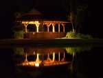 There was a small structure on an equally small island in the center of the pond.