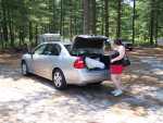 The Petal rummaging in the trunk of the rental. This is the only picture of the unremarkable Chevy Malibu rental.