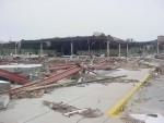 K-Mart as seen from the former entrance to Sav-A-Center.  Note the pickup truck in the middle of the wreckage.